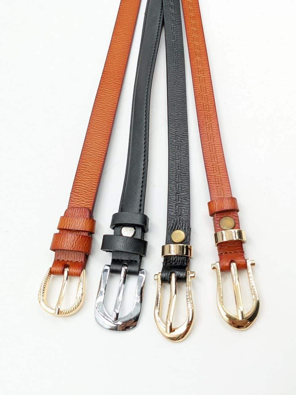 Four slim classic belts in tan, black and cognac