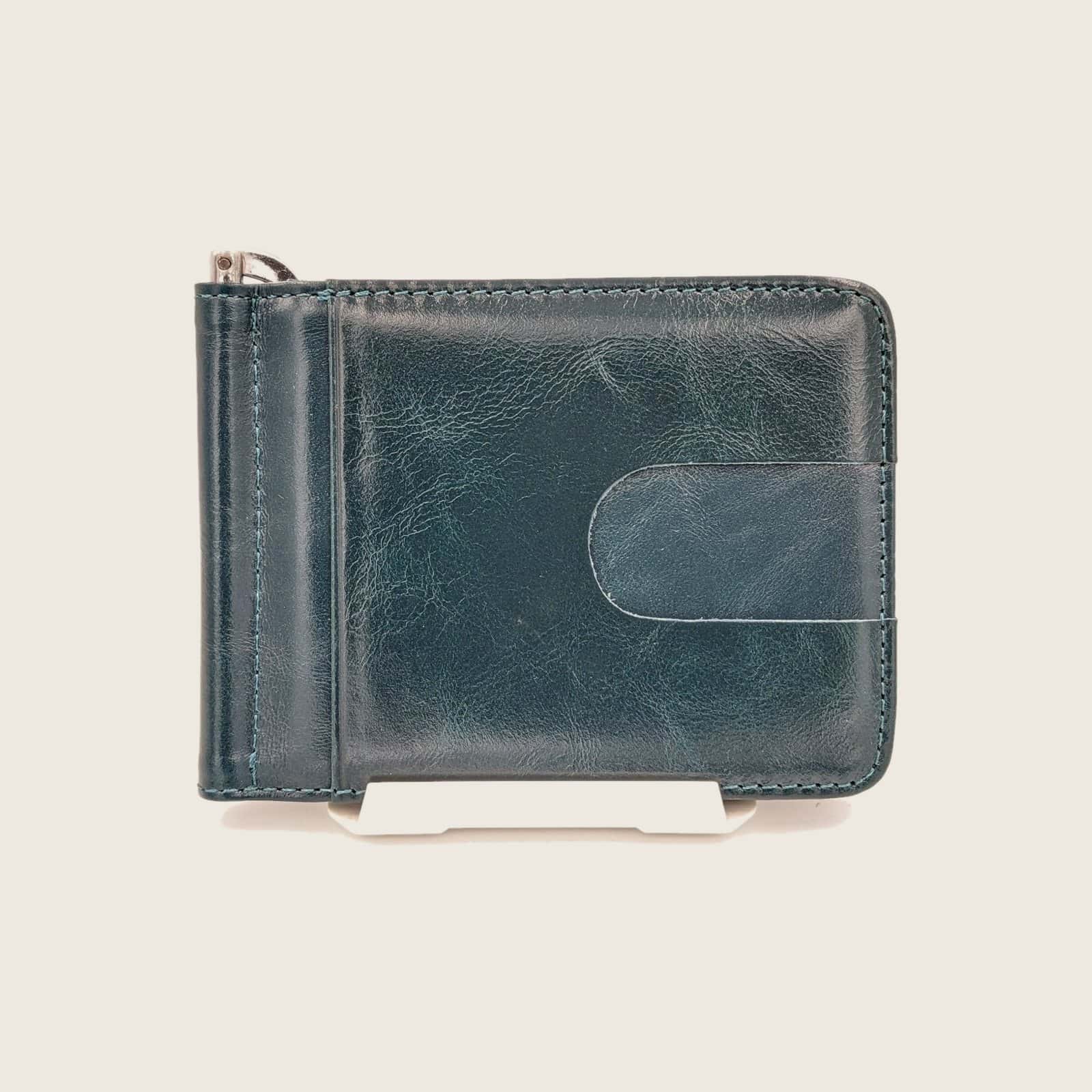 Money clip wallet with card slots behind the clip